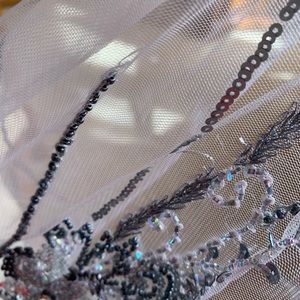 Voile material with amazing beads design for an evening gown